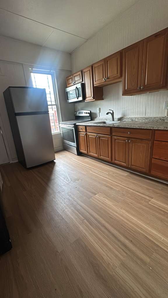 Rowhome rental in Broadway East, Baltimore, MD — 3 bed 1.5 bath